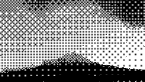 Mount Fuji stands beneath low clouds edged with warm light. Dithered grayscale treatment.