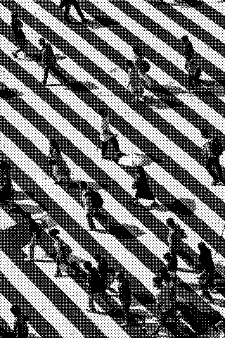 People and their long shadows move across a striped pedestrian crossing seen from above. Dithered grayscale treatment.